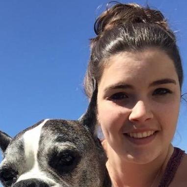 Rebecca Dickson is a professional dog boarding expert who balances her love for animals with knowledge of what they need.